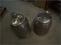 (2) Stainless steel milking jugs.