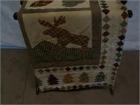 Quilt and stand.