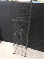 Metal cube storage rack. Measures 58 inches tall