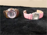 Two ladies watches. One Relic and one digital
