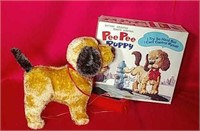 Nomura Toy Co Pee Pee Puppy 
In Great Condition