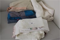 Group of quilts and linens