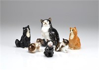 Six Royal Doulton cat figures