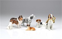 Six Royal Doulton dog figures