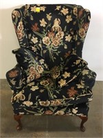 Floral upholstered wing back chair