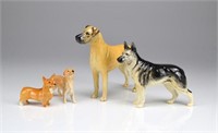 Four Beswick England dog figures