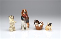 Four Royal Doulton dog figures