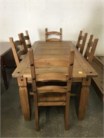 Modern farm table with six matching chairs
