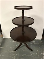 Three tier mahogany table;