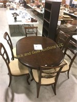 Round pedestal table with 6 chairs