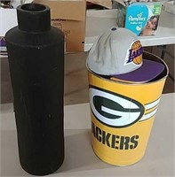 Vase and Packer can full of hats