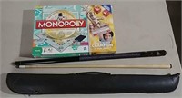 Pool cue and Monopoly game