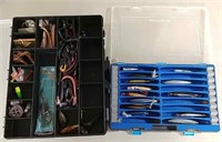 2 tackle boxes and fishing lures