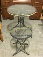 2 glass top patio tables