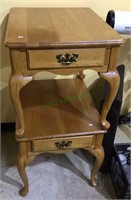 Two small side tables with one drawer each with