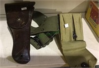 Green canvas belt with a green pouch and a