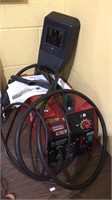 Lincoln electric welder with a facemask and wire
