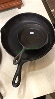2 cast iron frying pans, 11 inch and a 6 1/2