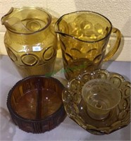 Five pieces of amber glass, includes two water
