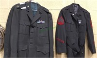 Three green military jackets, one with bar pens,
