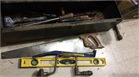 Large metal toolbox filled with tools, includes