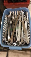 Small blue basket filled with about 50 wrenches,
