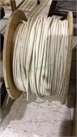Wood reel with a heavy duty white rope, (887)