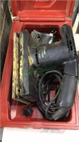 Sears craftsman electric sander in a red hard