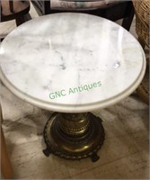 Small round white marble top side table with