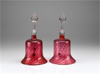 Two cranberry glass Victorian wedding bells