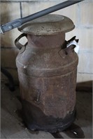 Rusted milk can