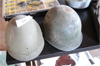 Two Army helmets