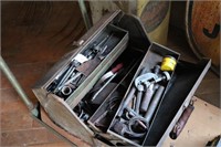 Old tool box with various tools