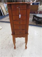 MODERN CARVED JEWELRY CABINET WITH JEWELRY