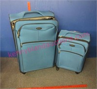 turquoise samsonite spinning suitcases & disney