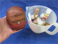 scentbug & scent oils in tupperware measuring cup