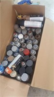 Large box of spray paint most full or close to