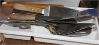 bin with ladles/utensils; spatulas