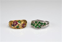 Two gold rings with mixed stones