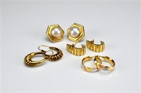 Four pairs of yellow gold earrings