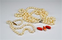 Two pearl necklaces and three coral beads
