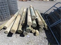 Stack of Wood Fence Posts  used