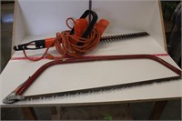 Hedge trimmer and handsaw