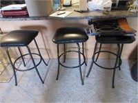 Three counter height stools