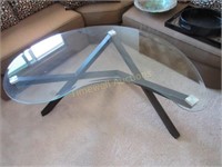 Glass top kidney shaped coffee table