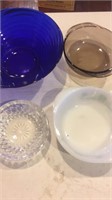 Four miscellaneous glass bowls
