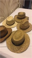 Five straw type hats