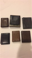 Six leather wallets