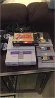 Super Nintendo game system two remotes four games