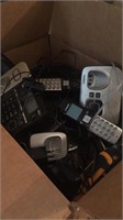 Box of VTEC and Uniden land phones